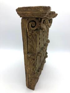 Antique wooden Corinthian capital  