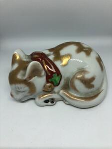 Antique Japanese porcelain sleeping cat