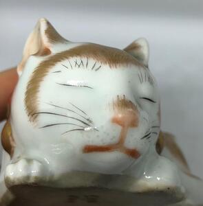 Antique Japanese porcelain sleeping cat