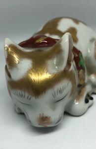 Antique Japanese porcelain sleeping cat