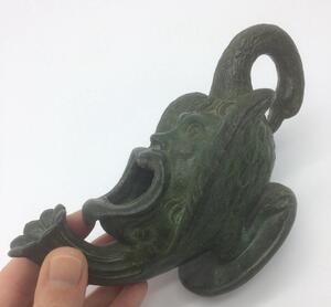 Grand Tour style grotesque bronze oil lamp 