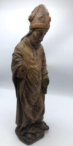 XV century oak religious sculpture of Saint Eloy