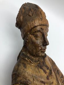 XV century oak religious sculpture of Saint Eloy